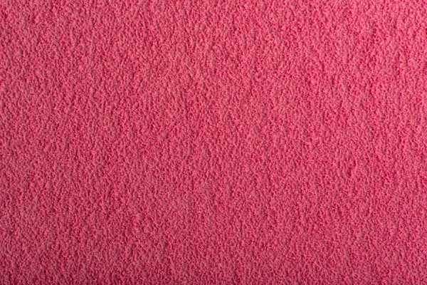 Малиновый абстрактный фон. шероховатая фактурная розовая поверхность
